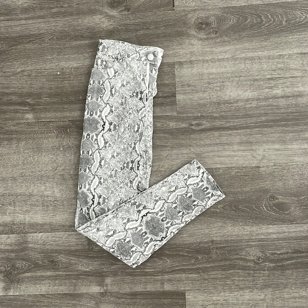 Snake print skinny jeans high rise